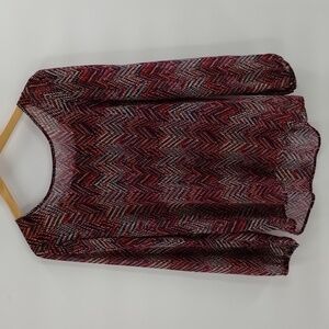 Maurices sheer long sleeve size medium blouse with open detail in back